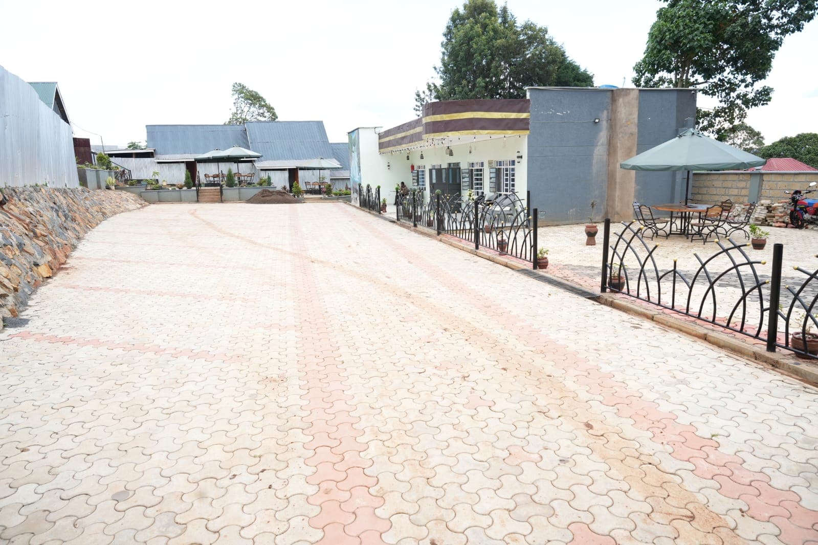 Hotel exterior showing the driveway and building facade